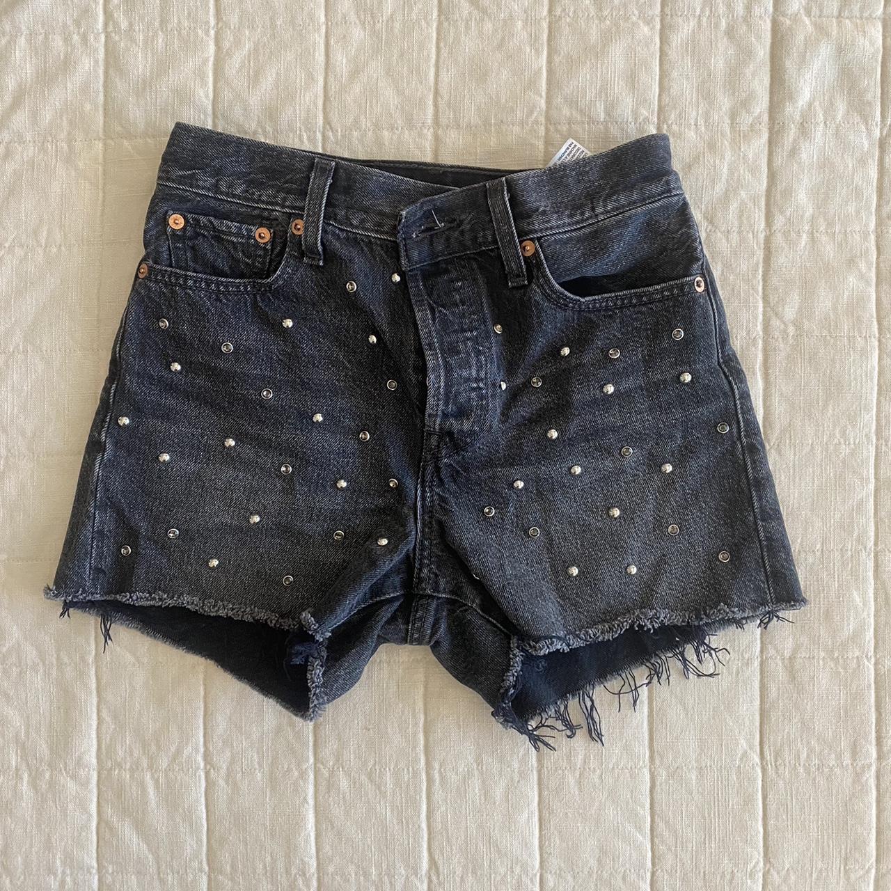 super cute levi’s black denim shorts with metal... Depop
