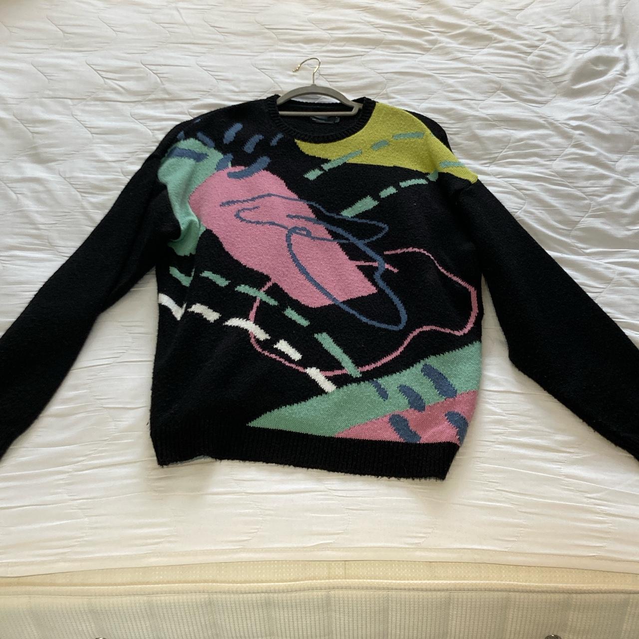 This 1980s inspired sweater is sure to have you... - Depop