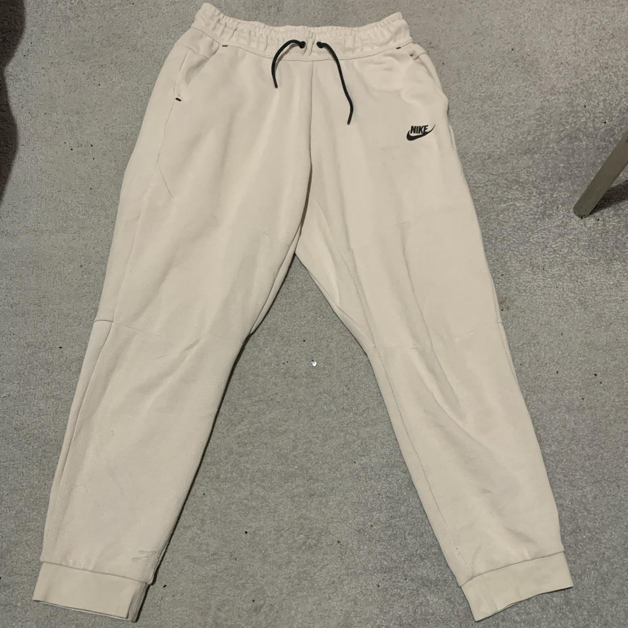 nike tech cream joggers