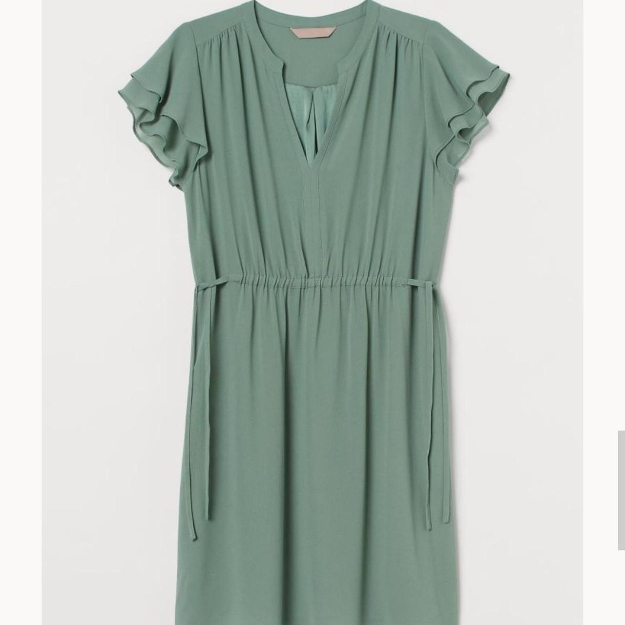 H&M Green dress with hip tie details. Loose material... Depop