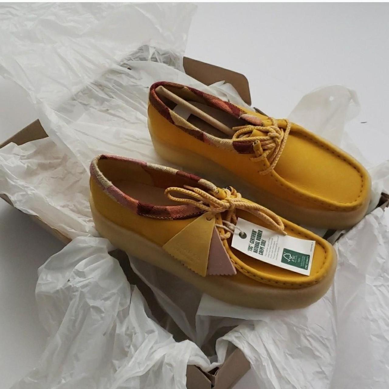 Clarks store flats yellow