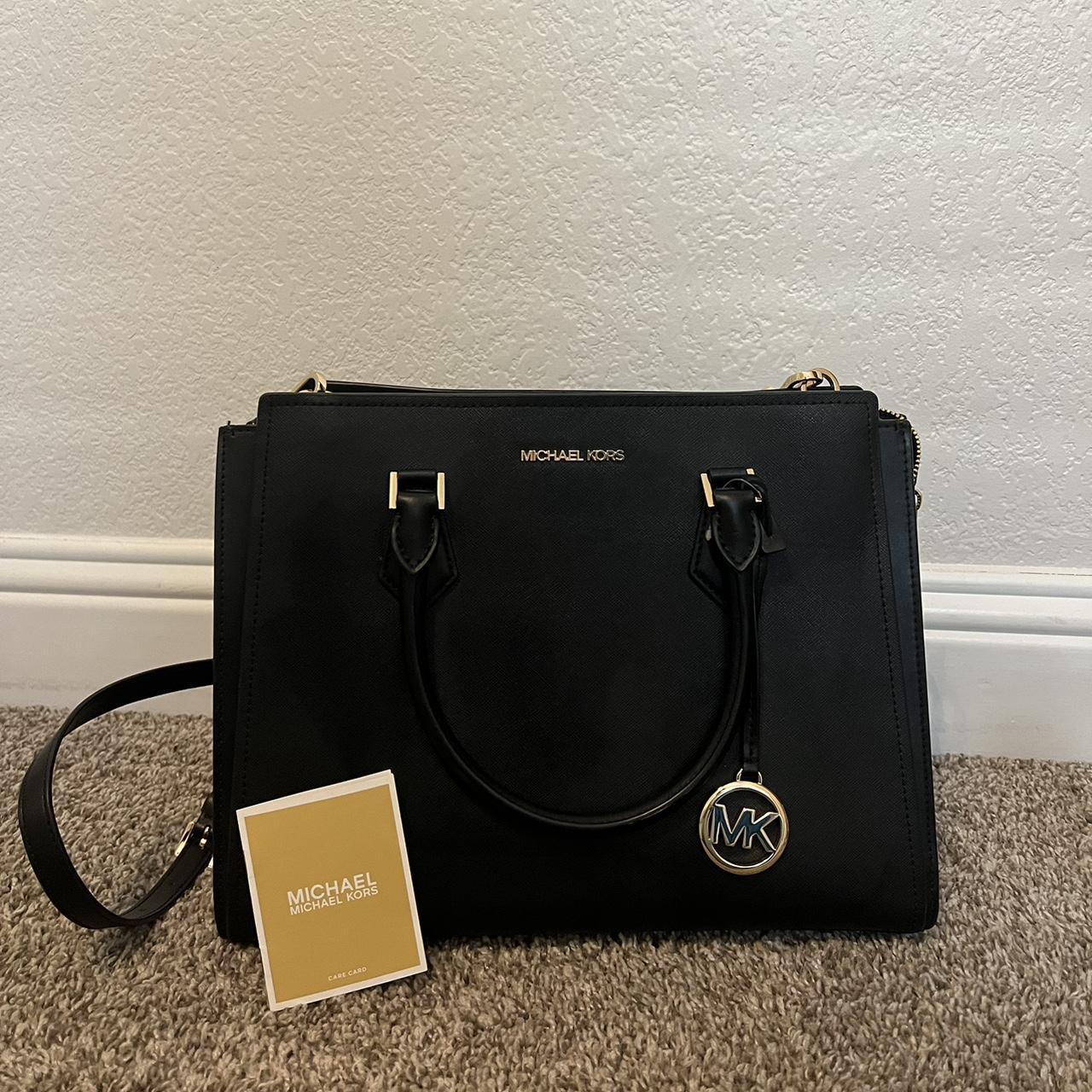 Michael kors bag hot sale black and gold