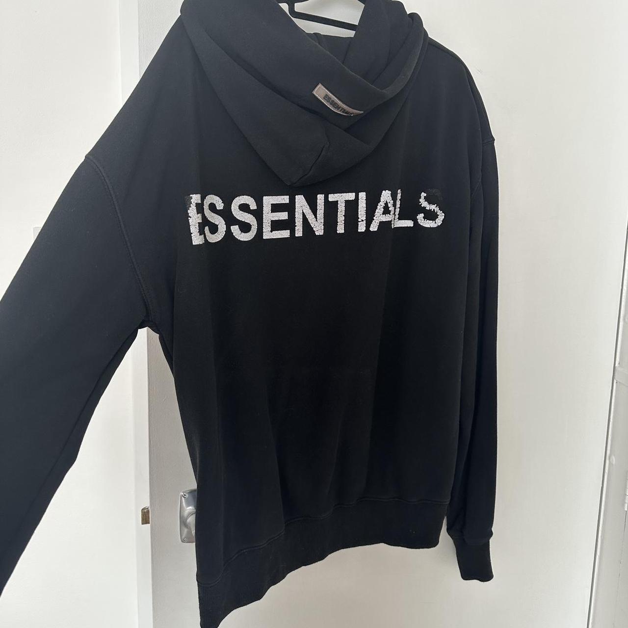Essentials black hoodie - size M - shown on an... - Depop