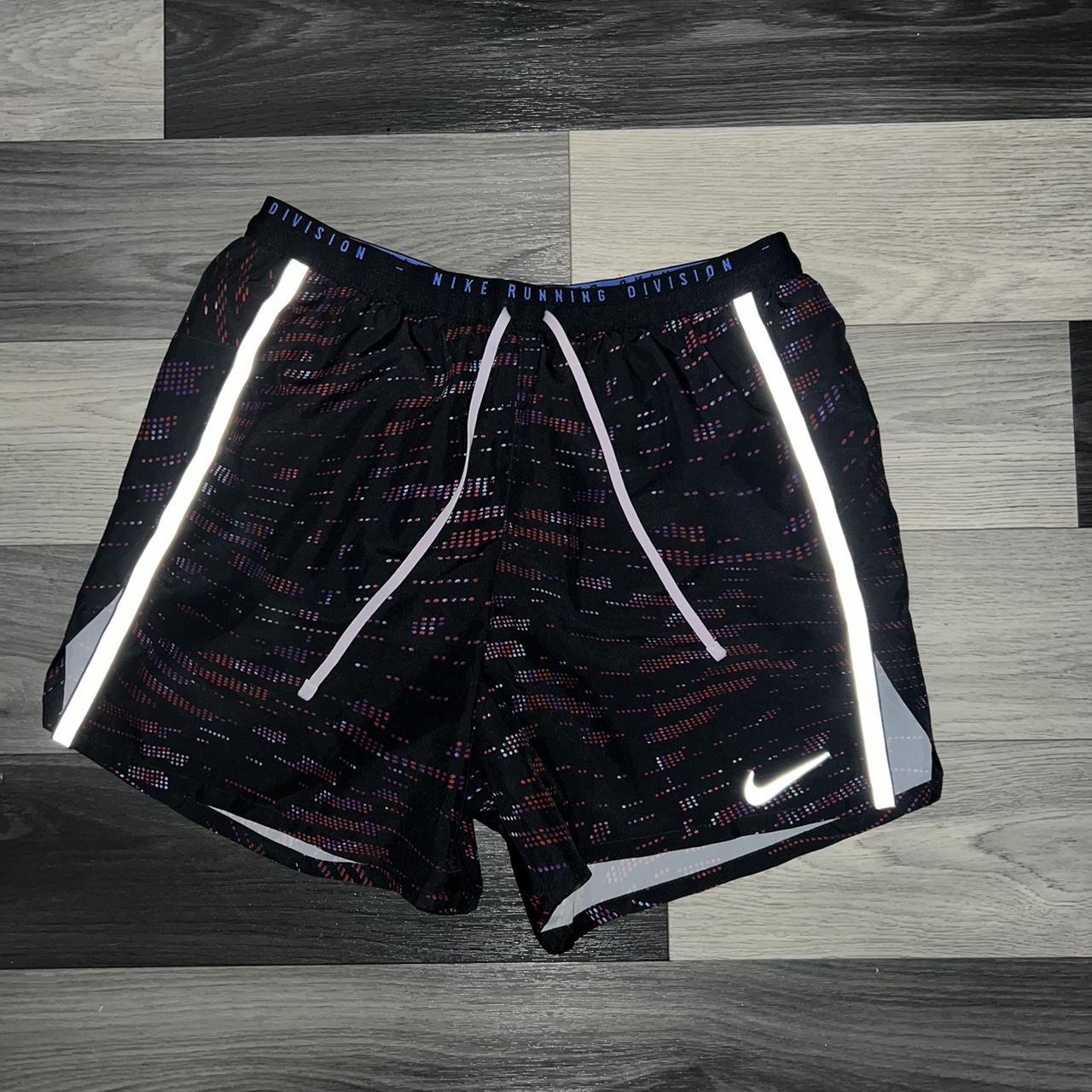 multicoloured nike shorts