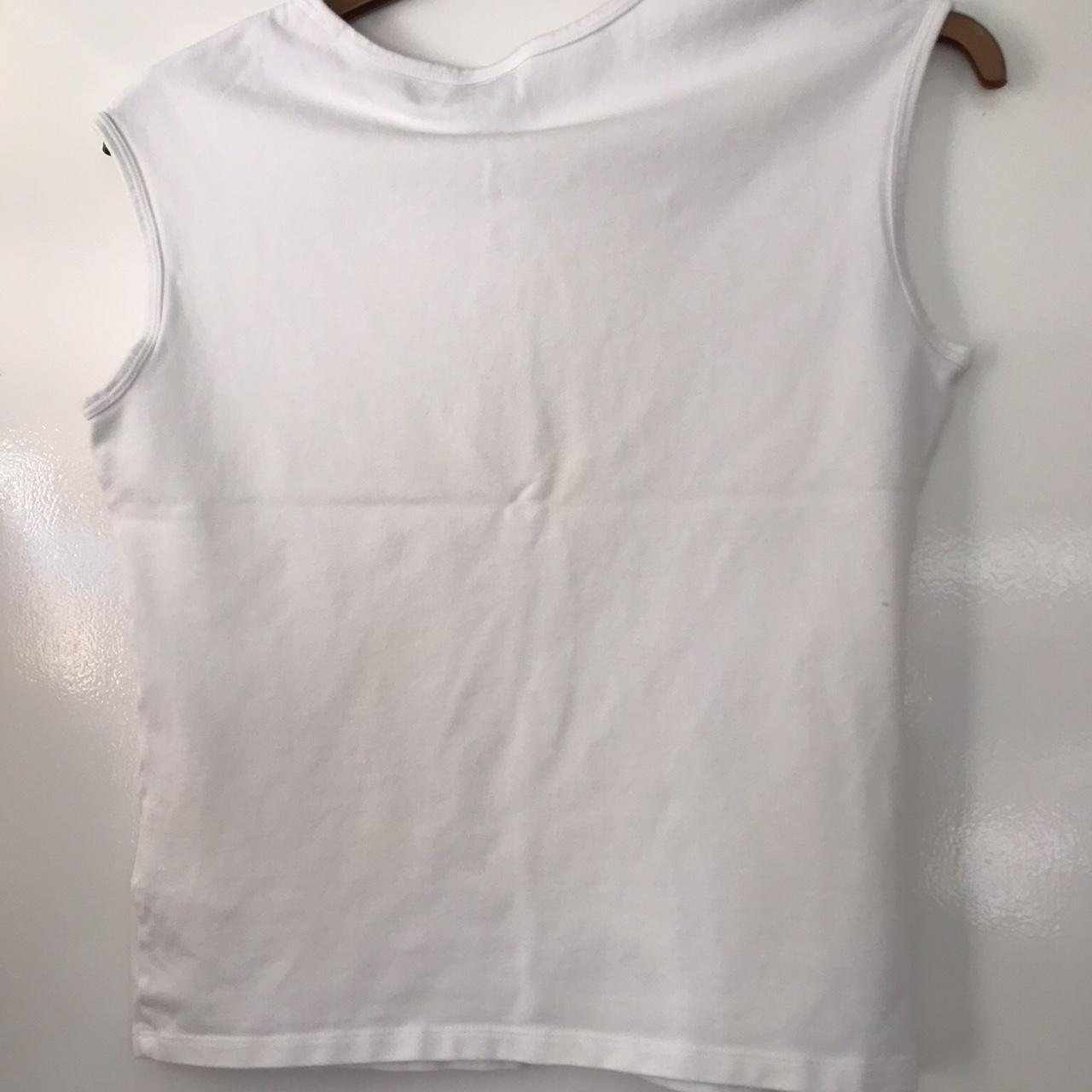 White Nike sports top. Slight mark as pictured. Size... - Depop