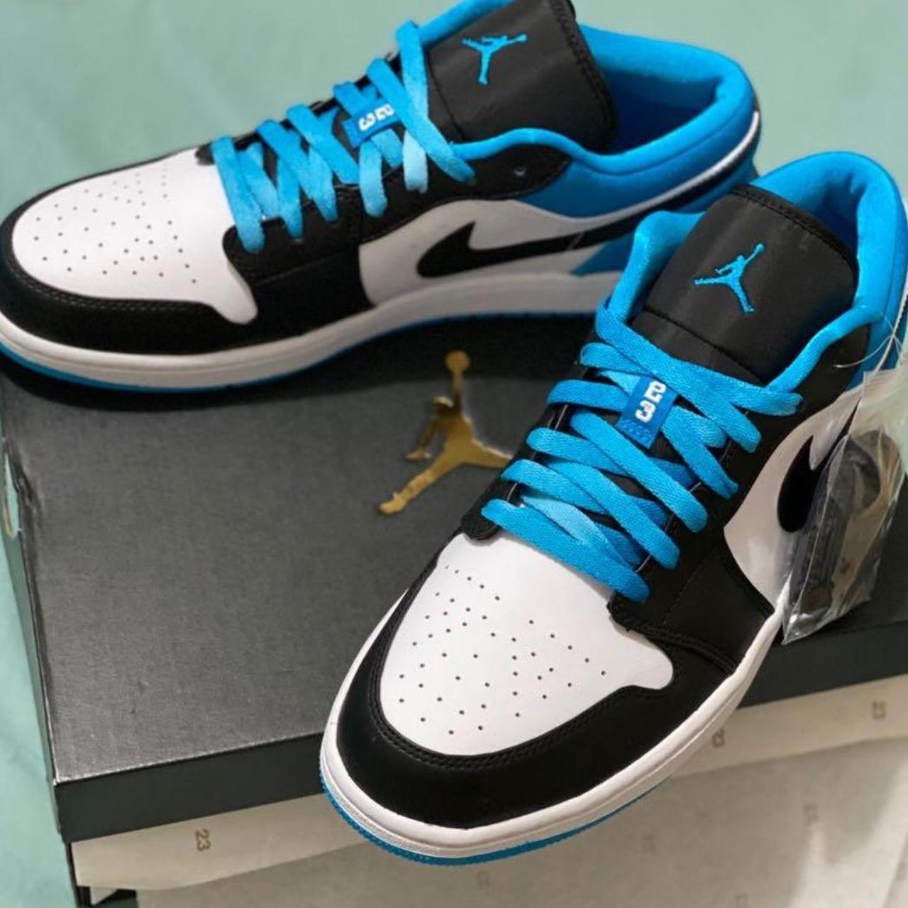 all black jordan low tops