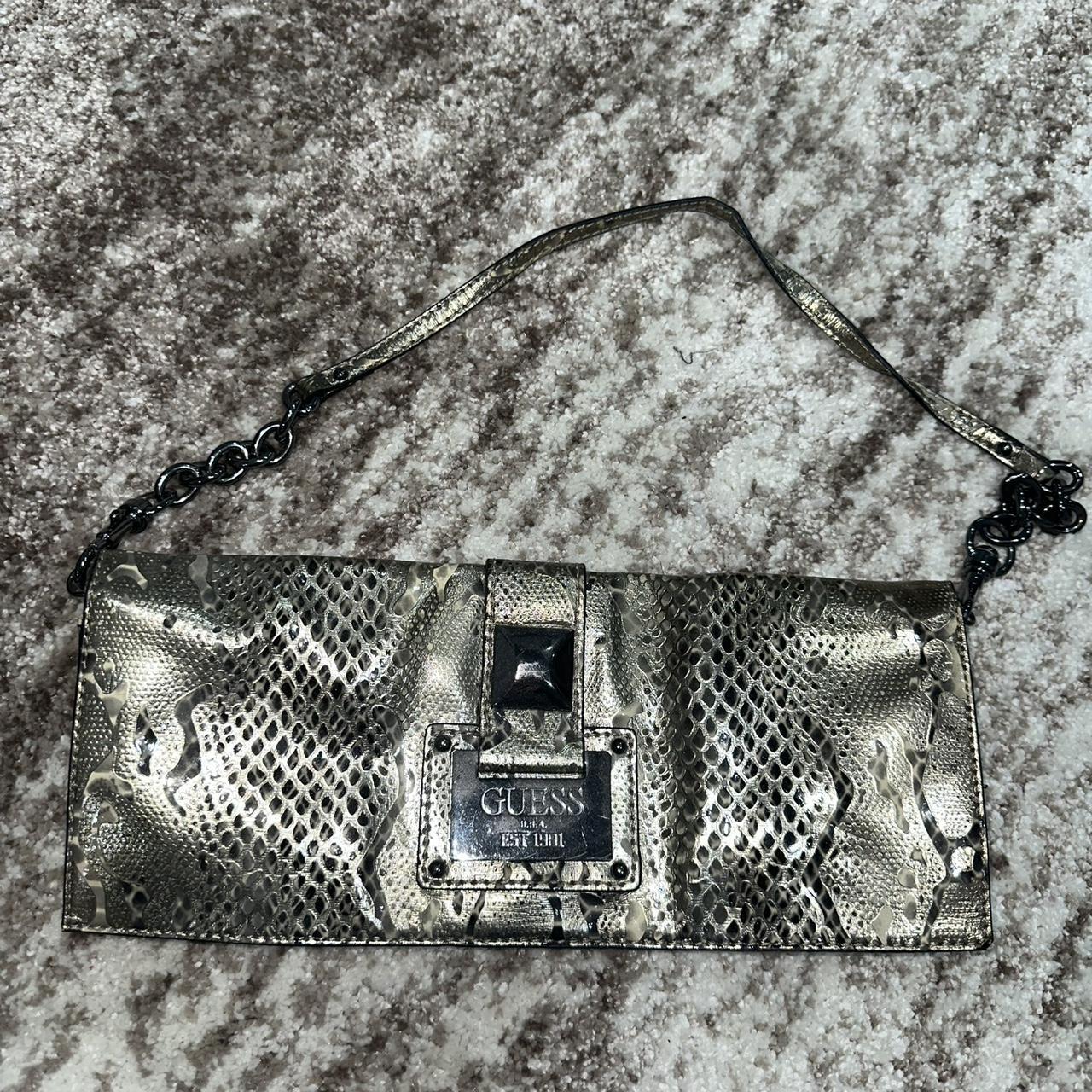 Silver snakeskin clutch bag on sale