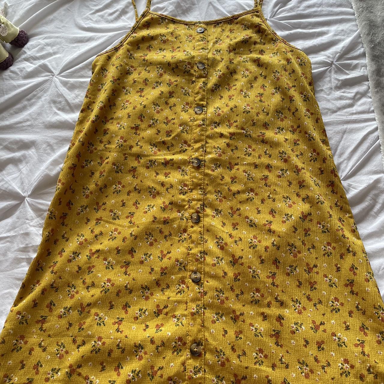 girls aged 1213 yellow primark dress with flowers... Depop