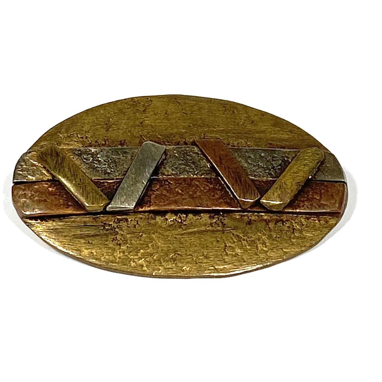 Mixed metal modernist store brooch