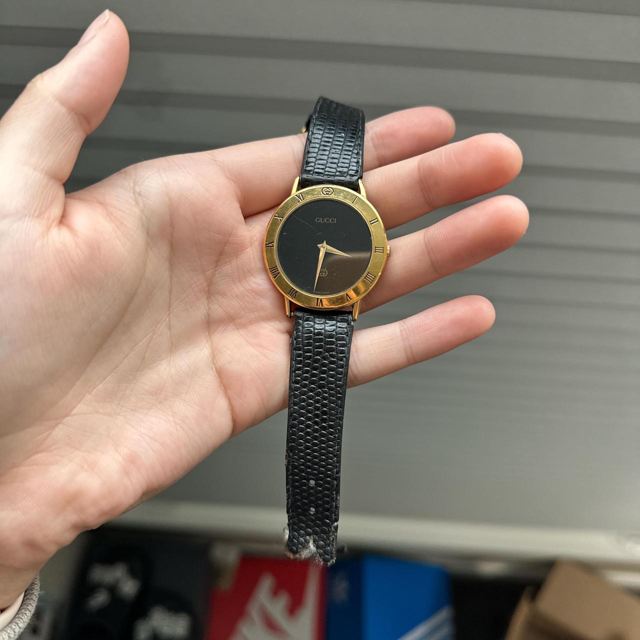 Black and gold gucci watch hotsell