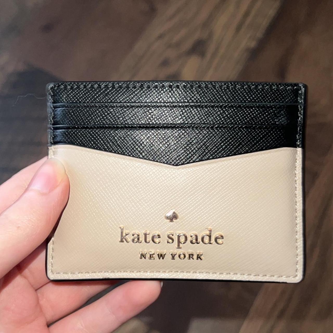 Kate spade black and cheap tan wallet