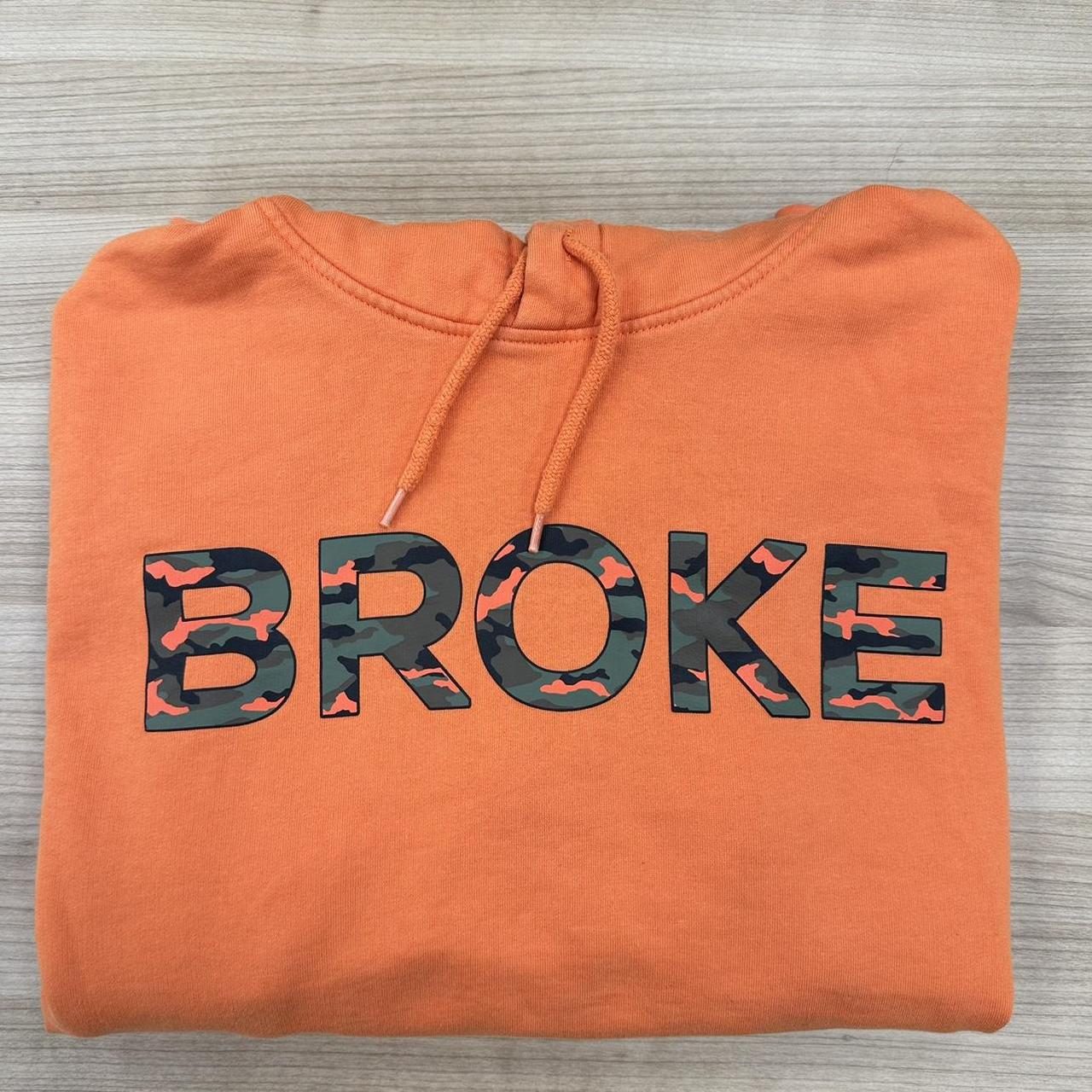 Orange broke sale hoodie