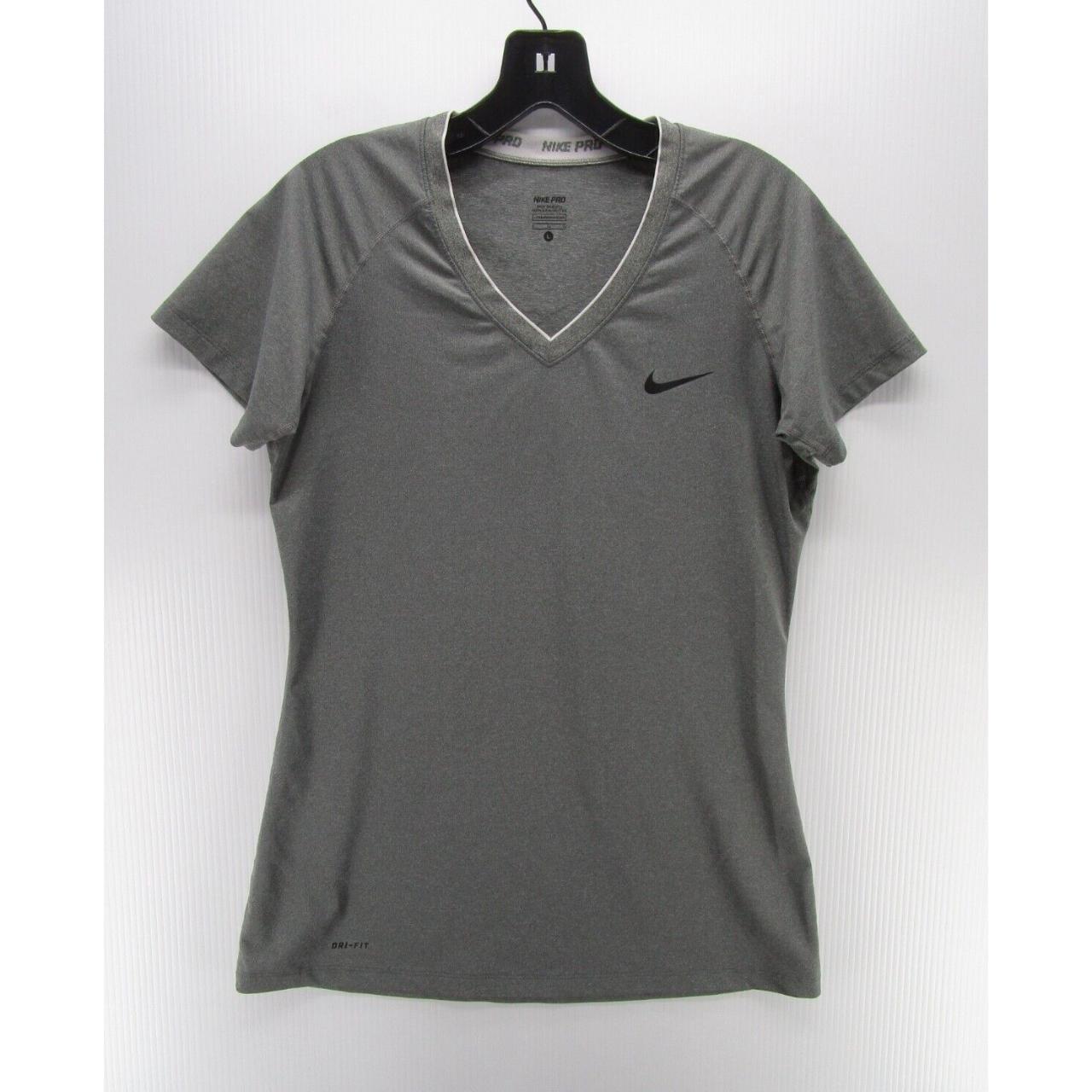 nike girls/women's athletic shirt size XL would fit - Depop