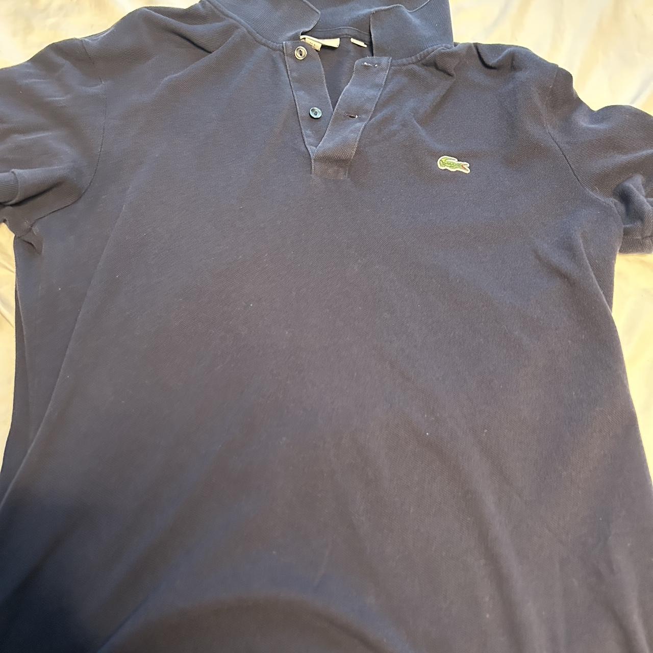 Dark blue lacoste polo very good condition size L... - Depop