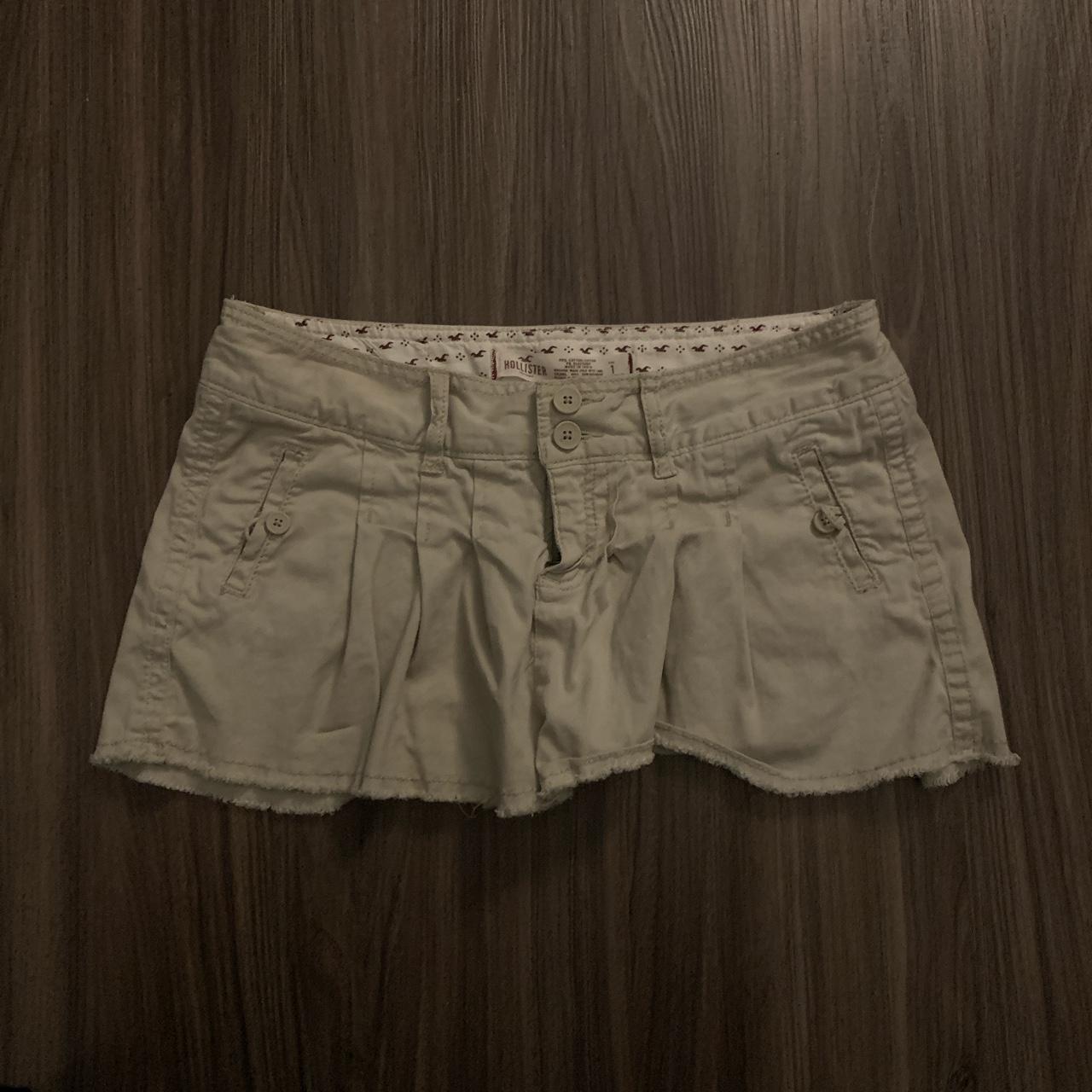 hollister khaki low waisted mini skirt size:... - Depop