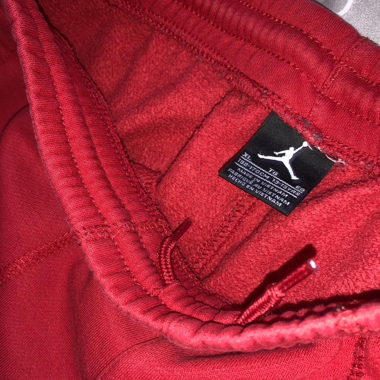 Red Jordan joggers, adjustable string on inside... Depop