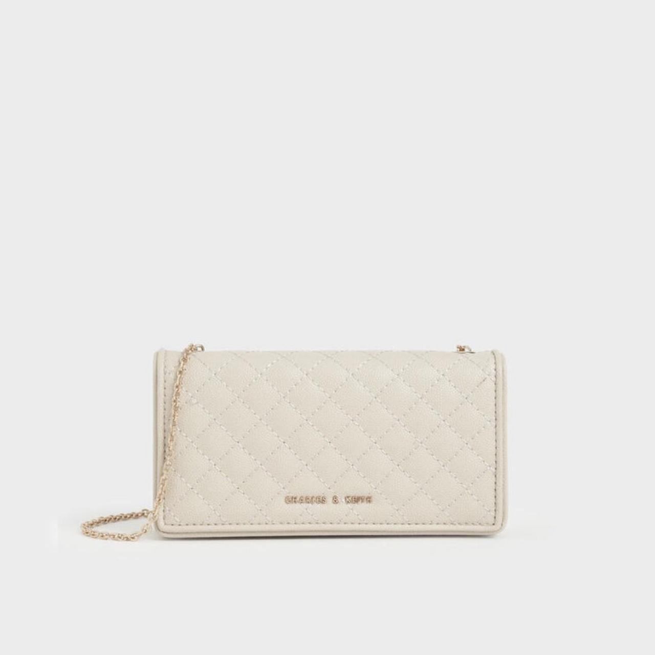 Charles & Keith | quilted pouch cream Great... - Depop