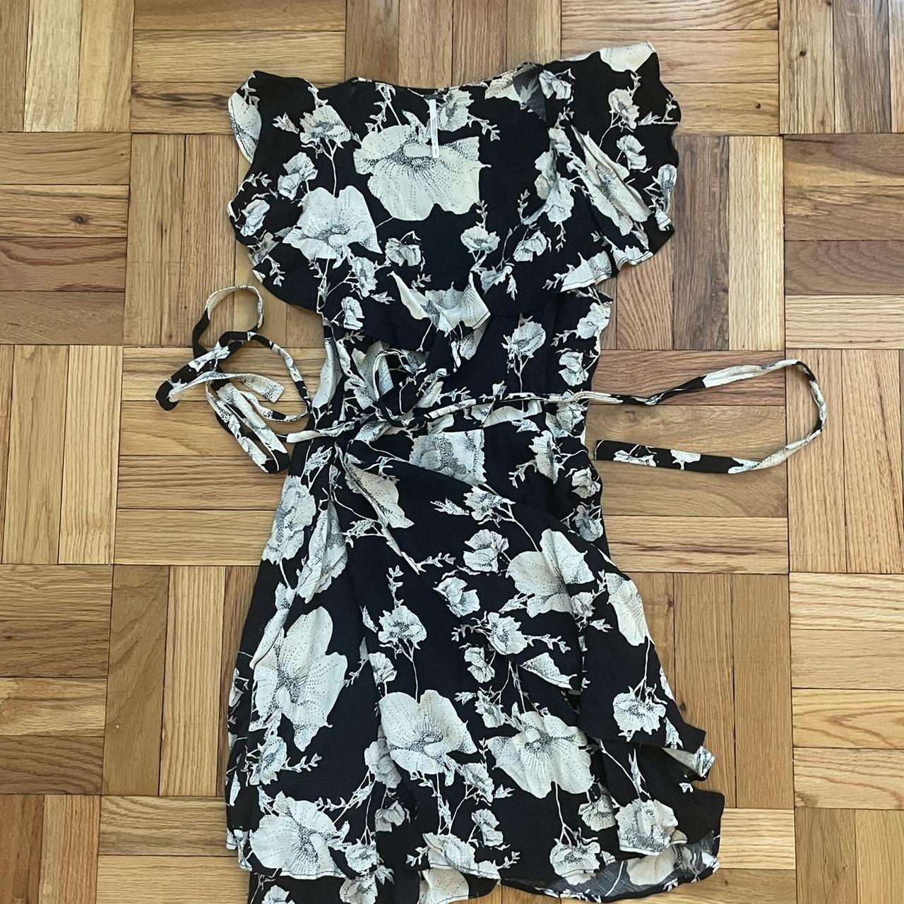 Free People Black and white floral wrap dress with. Depop