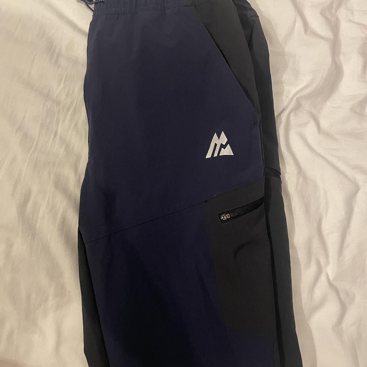 Navy and black montirex tracksuit bottoms , never worn - Depop