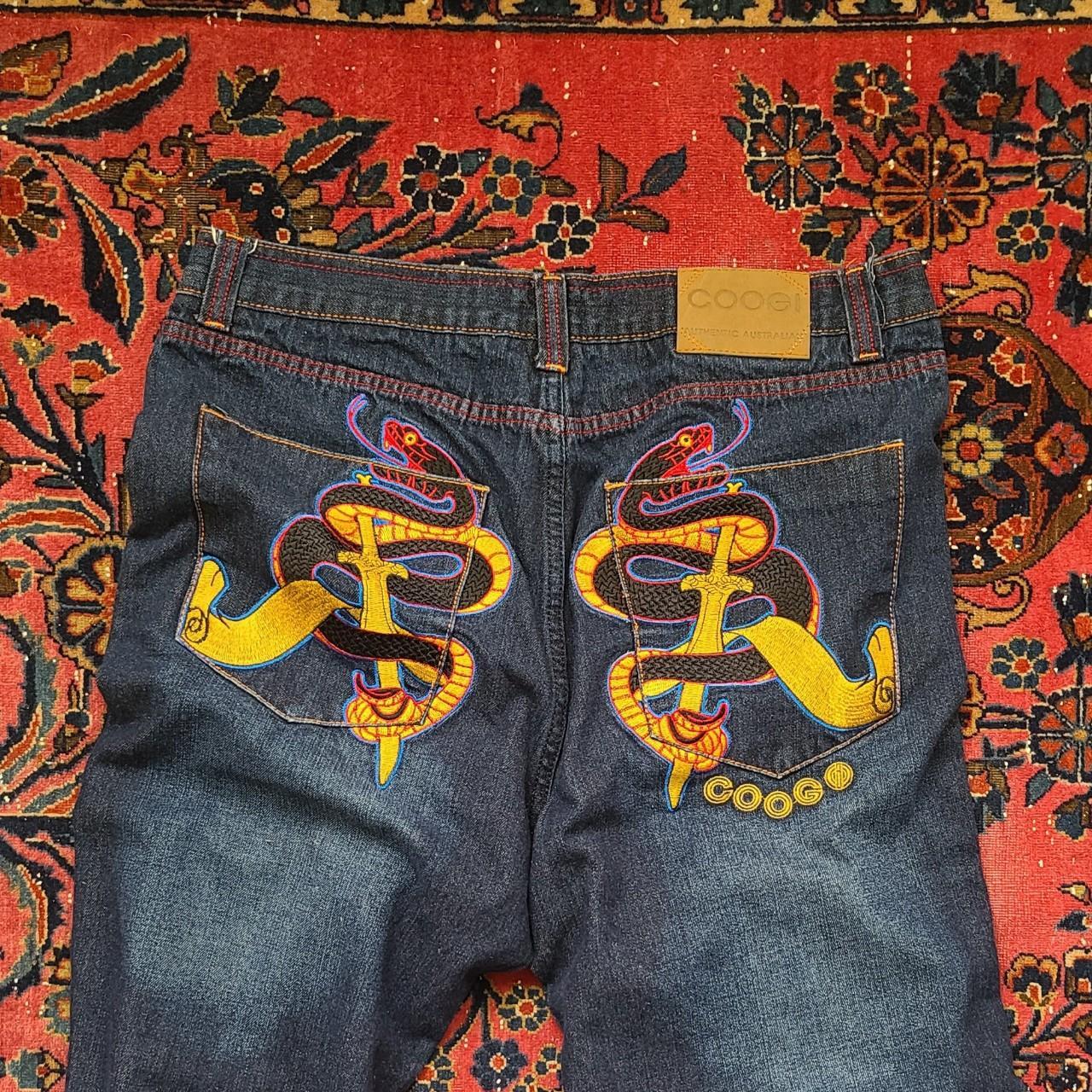 Coogi 38x34 jeans These are have snake and sword ... - Depop