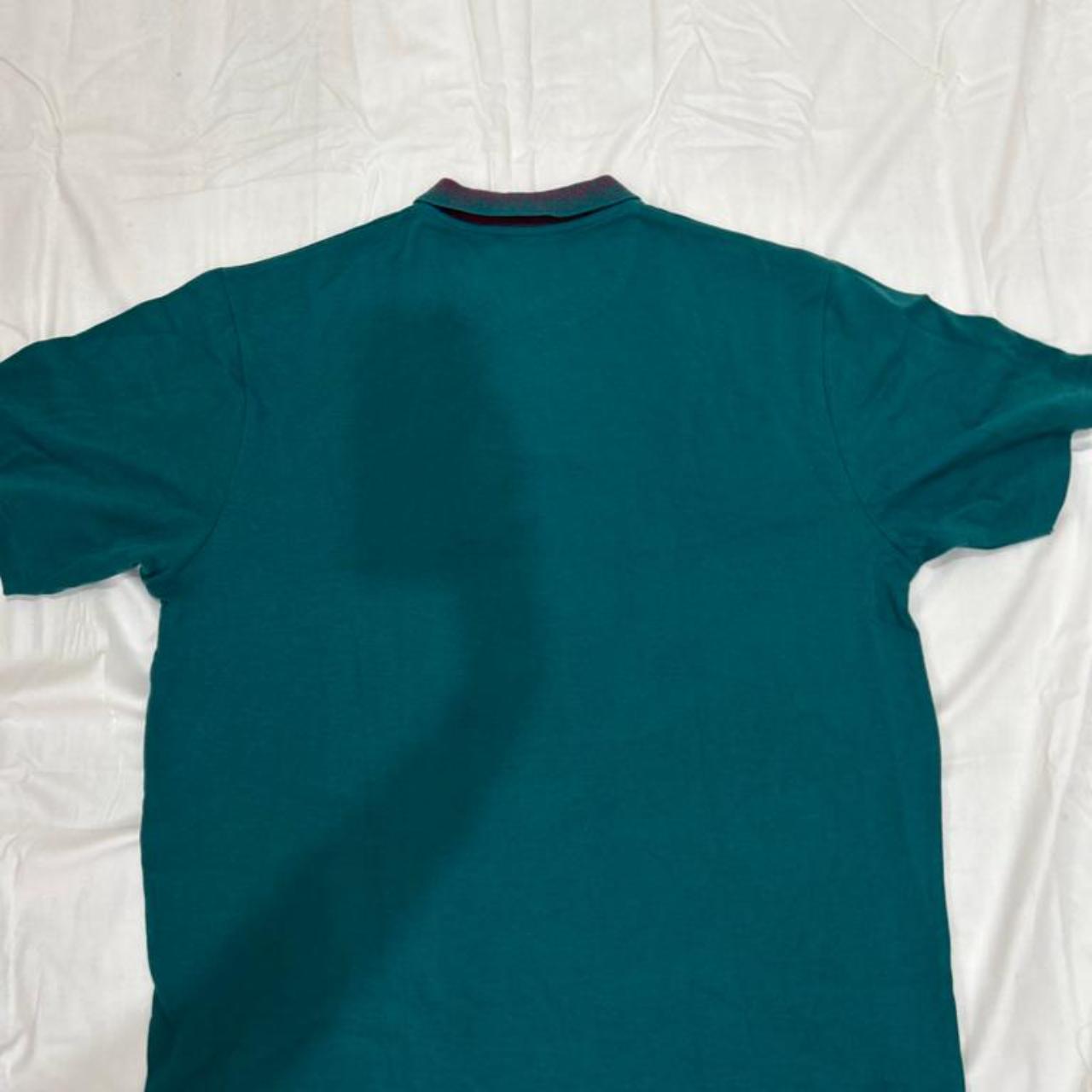 Green-aqua coloured Polo Mens T-shirt, the brand is... - Depop