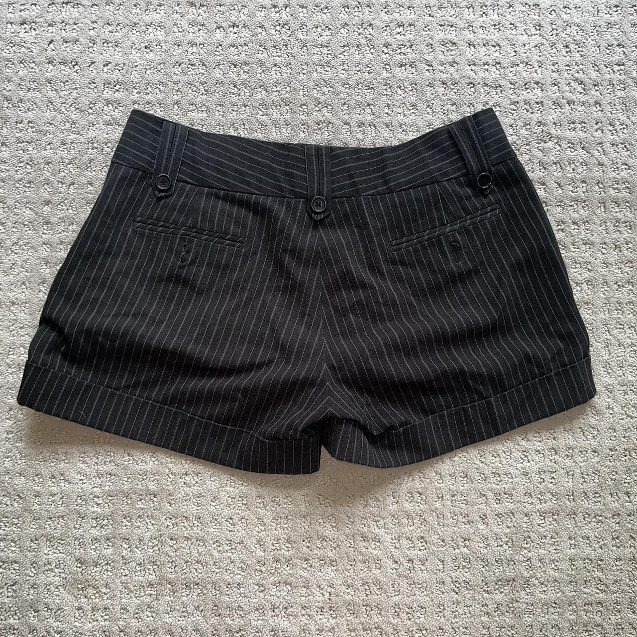 pinstripe black lowrise shorts, no size listed but i... - Depop