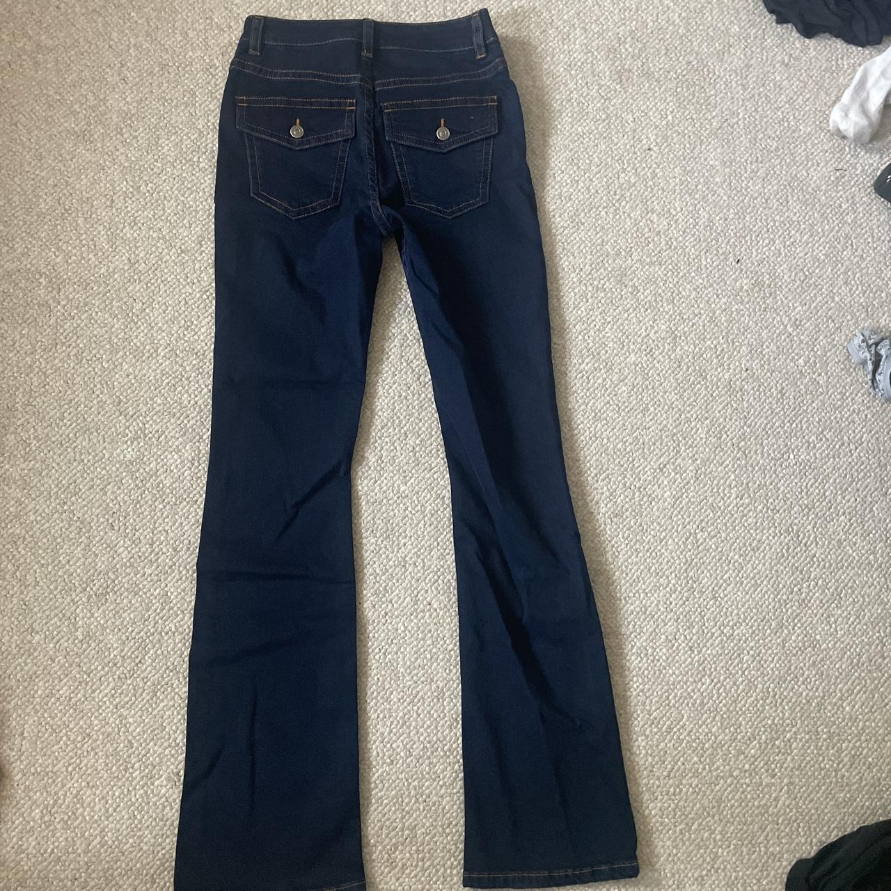 - Dark wash, mid rise bootcut jeans. - New with... - Depop