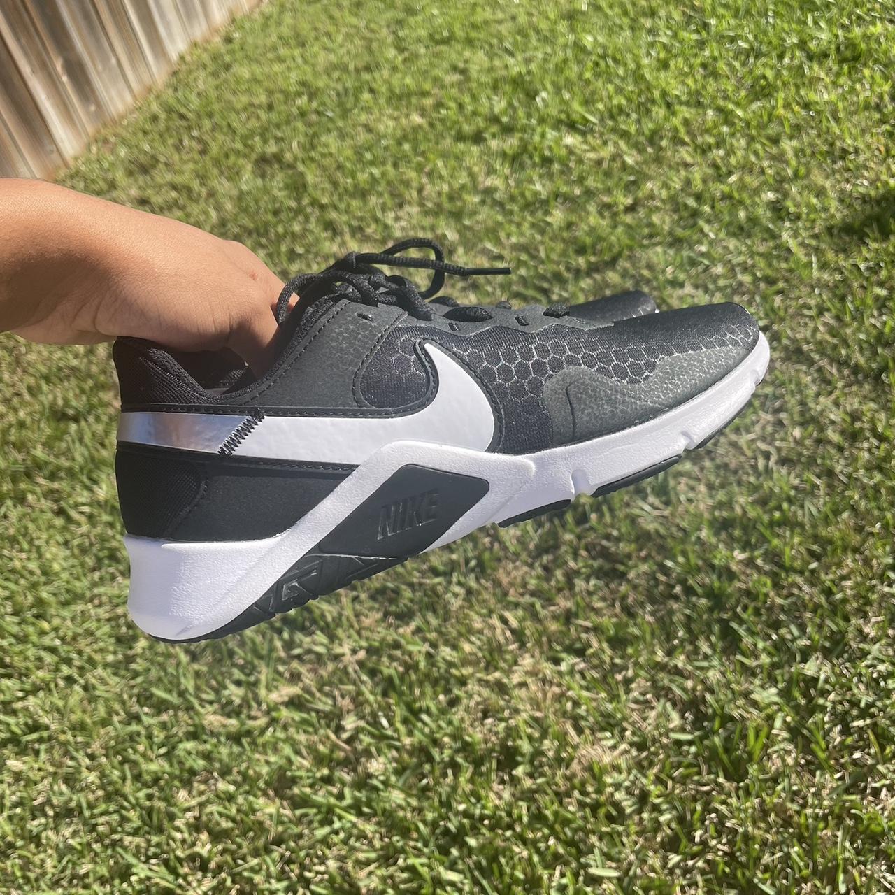 buy black nike shoes