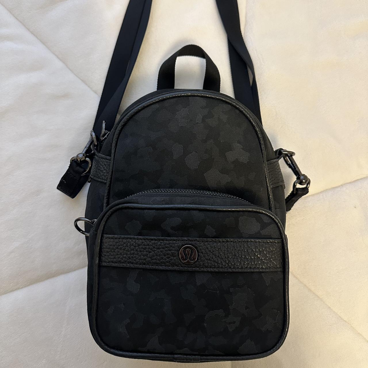 Lululemon small backpack purse. Comes with across Depop