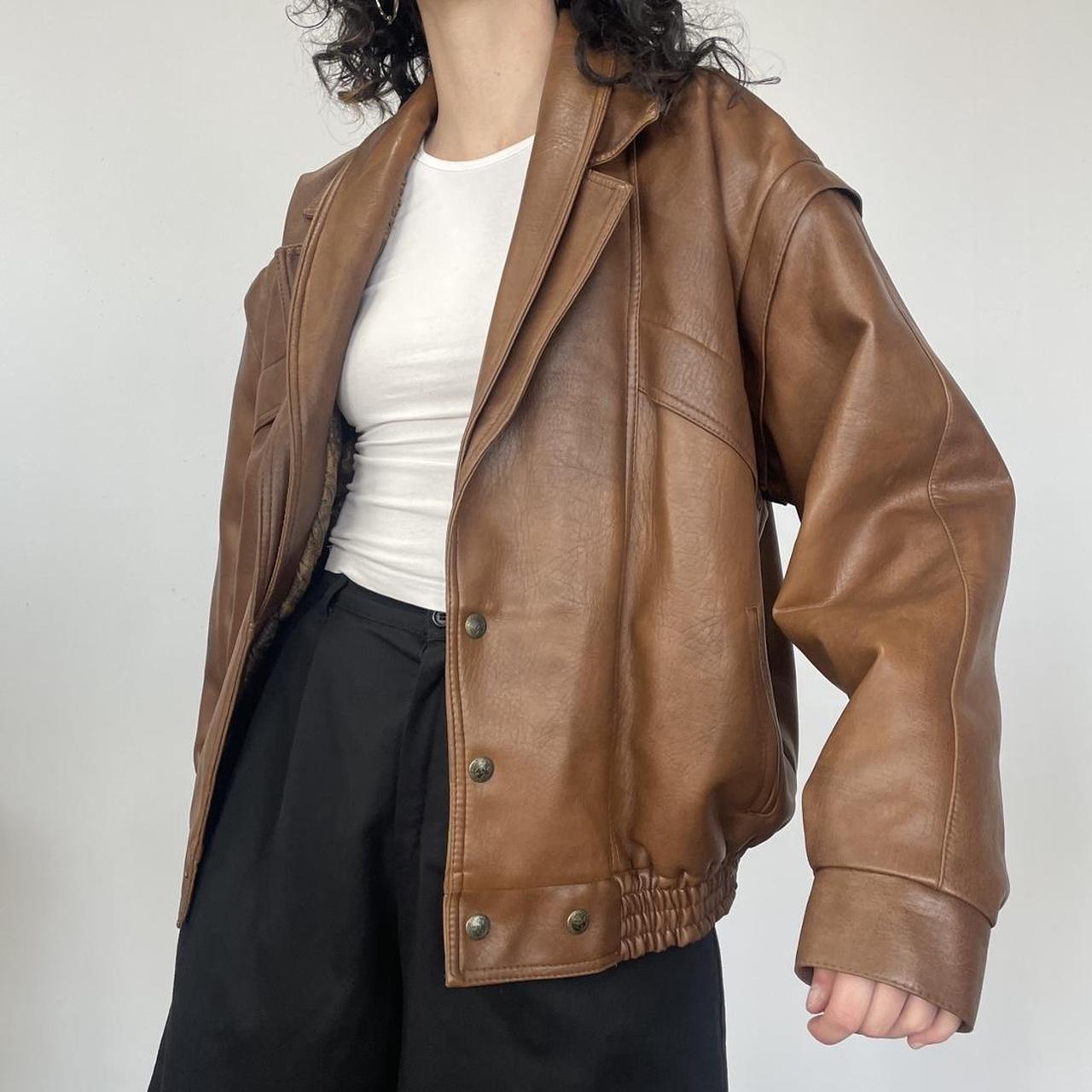 Brown boxy leather jacket Best fit up to a size L... - Depop