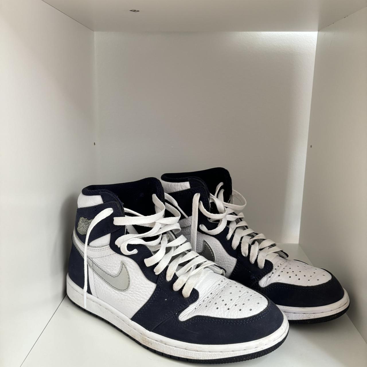 midnight navy jordan 1 goat