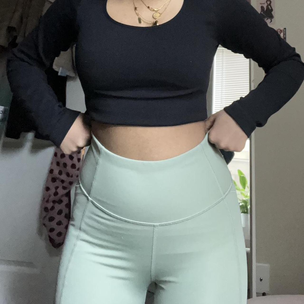 mint green workout leggings with cutouts all over. - Depop