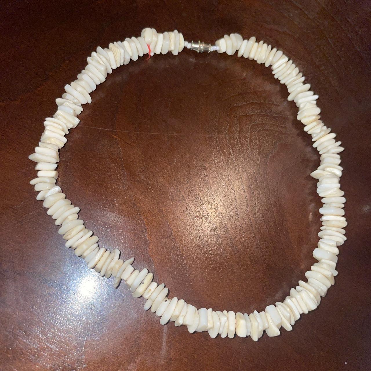 Authentic Hawaiian Puka shell necklace with Hawaiian flower medallion for  sale in Boonville, MO - 5miles: Buy and Sell
