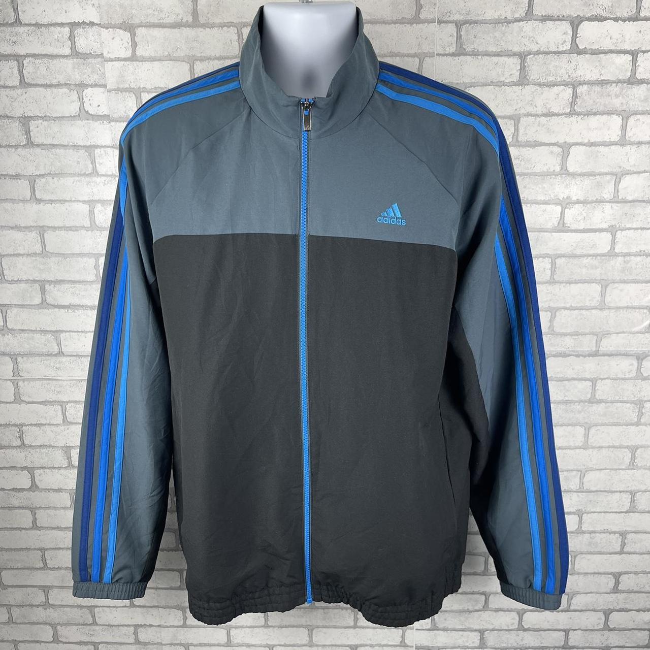 Adidas black jacket with blue stripes online