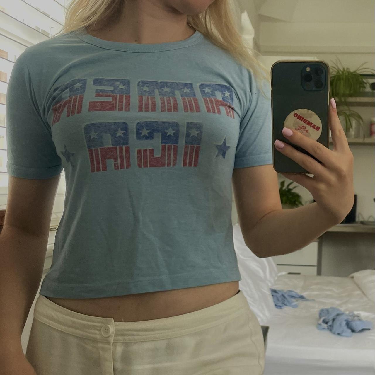 lovely baby blue crop top/ baby tee with ‘america’... - Depop