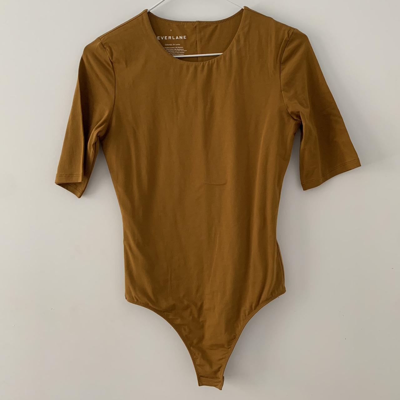 Everlane short sleeve crew neck body suit. never... Depop