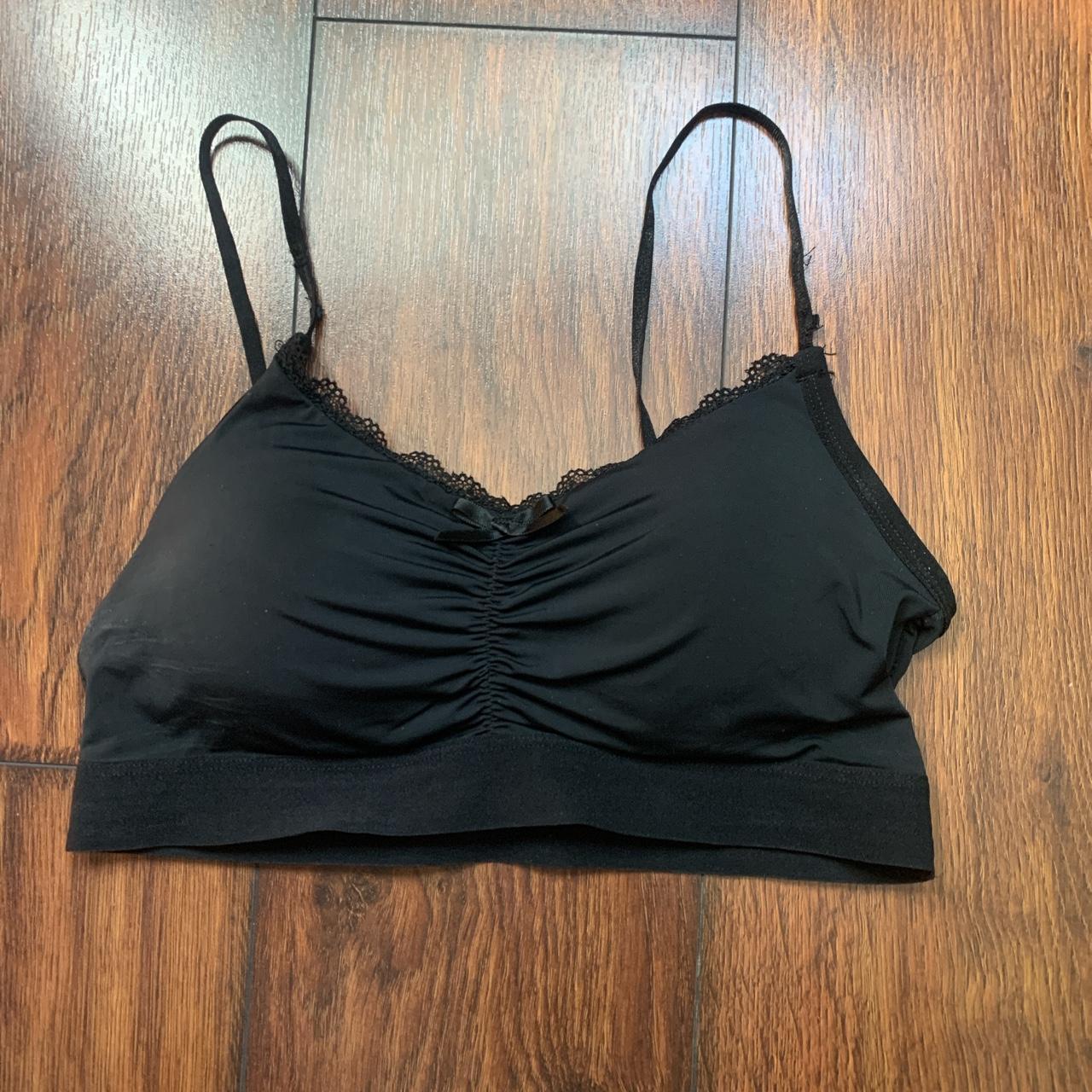 Small Black lace with bow top probably closer to a