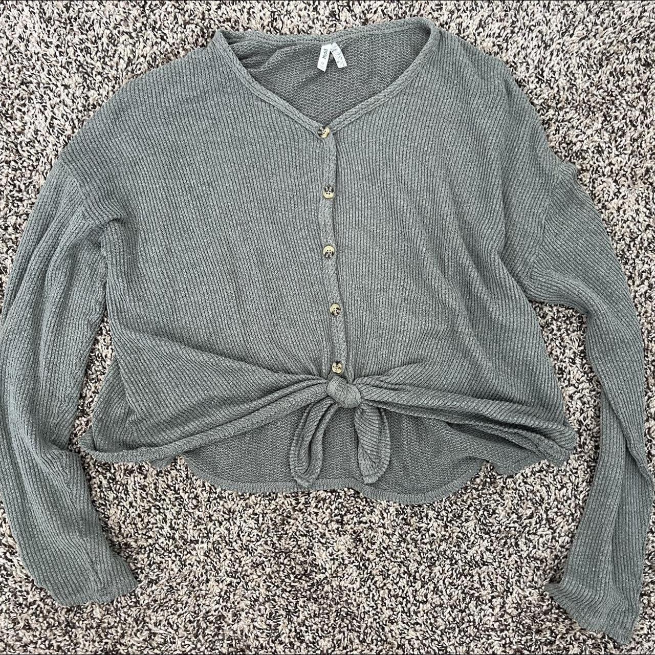 Light green cardigan. The front of the cardigan is... - Depop
