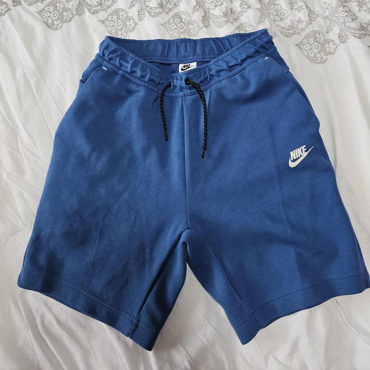 Blue small Nike tech shorts. Like new. - Depop