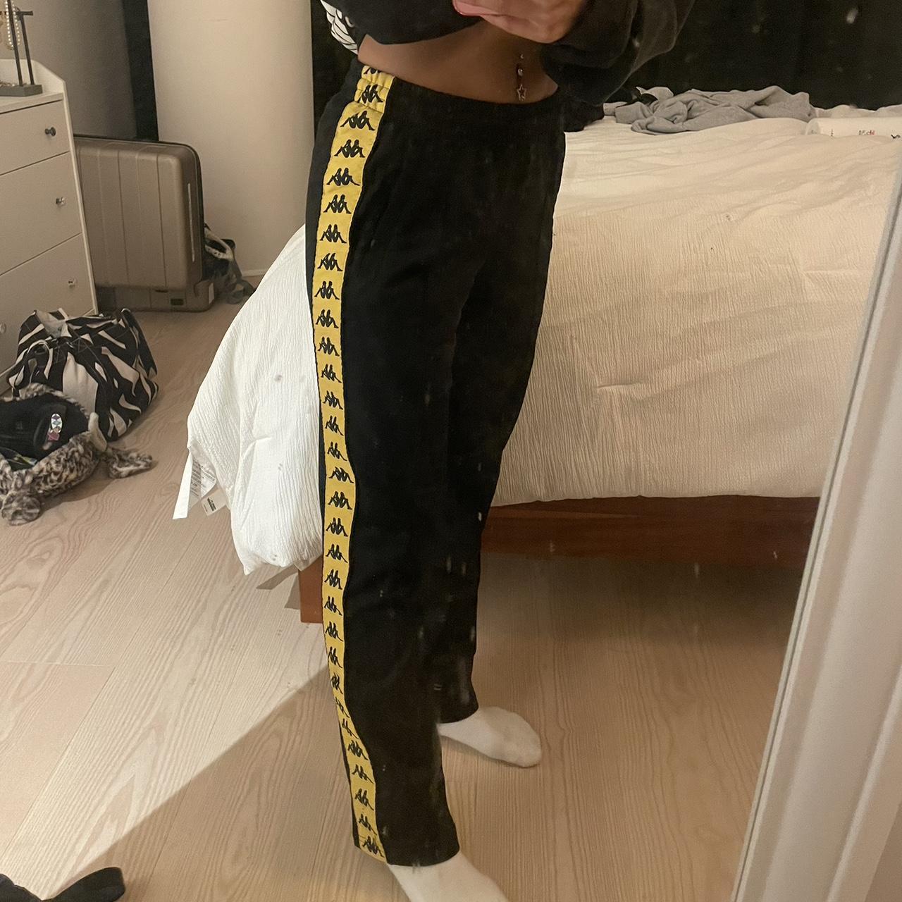 Black and yellow kappa 2024 pants