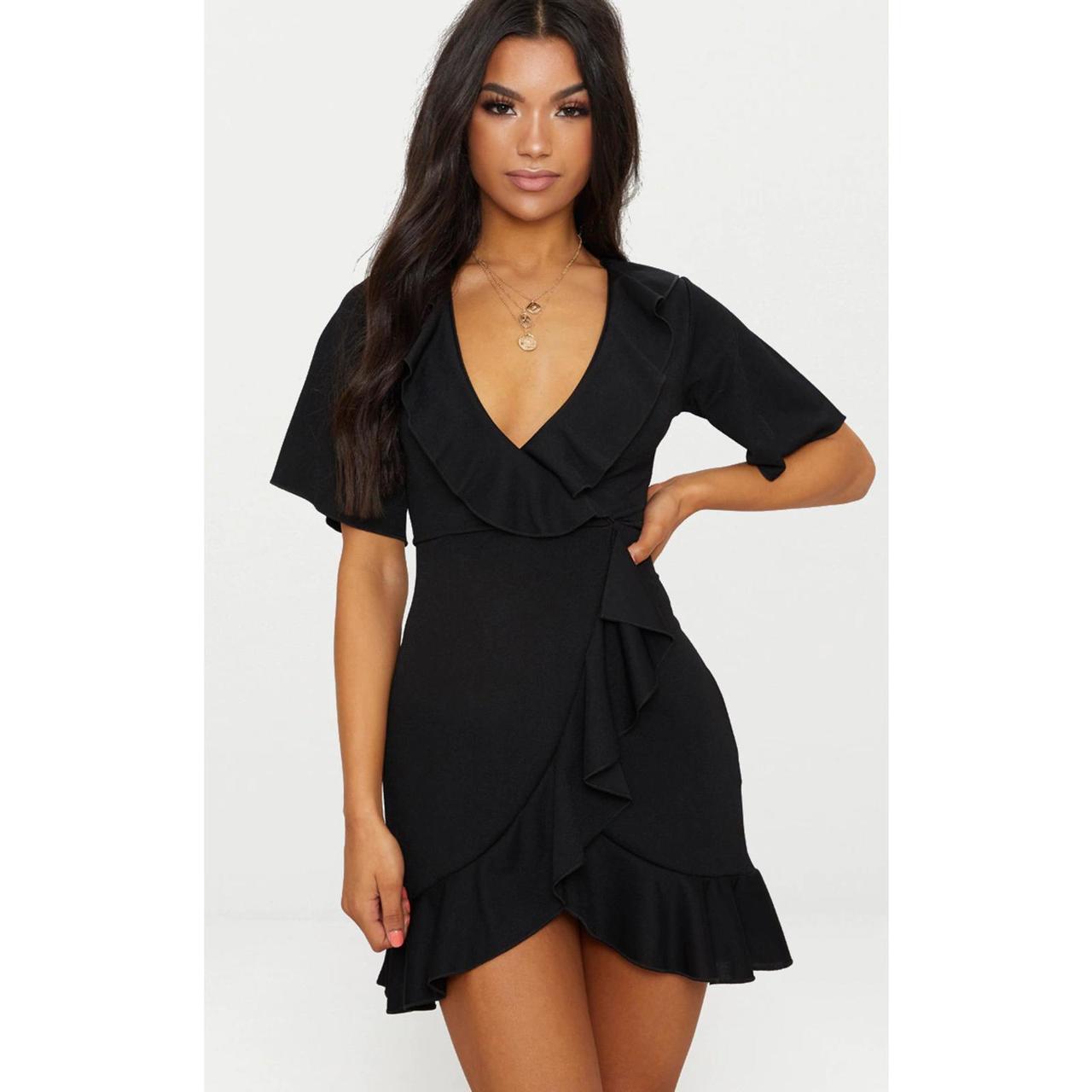 PrettyLittleThing Black Frill Ruffle Hem Detail Wrap. Depop