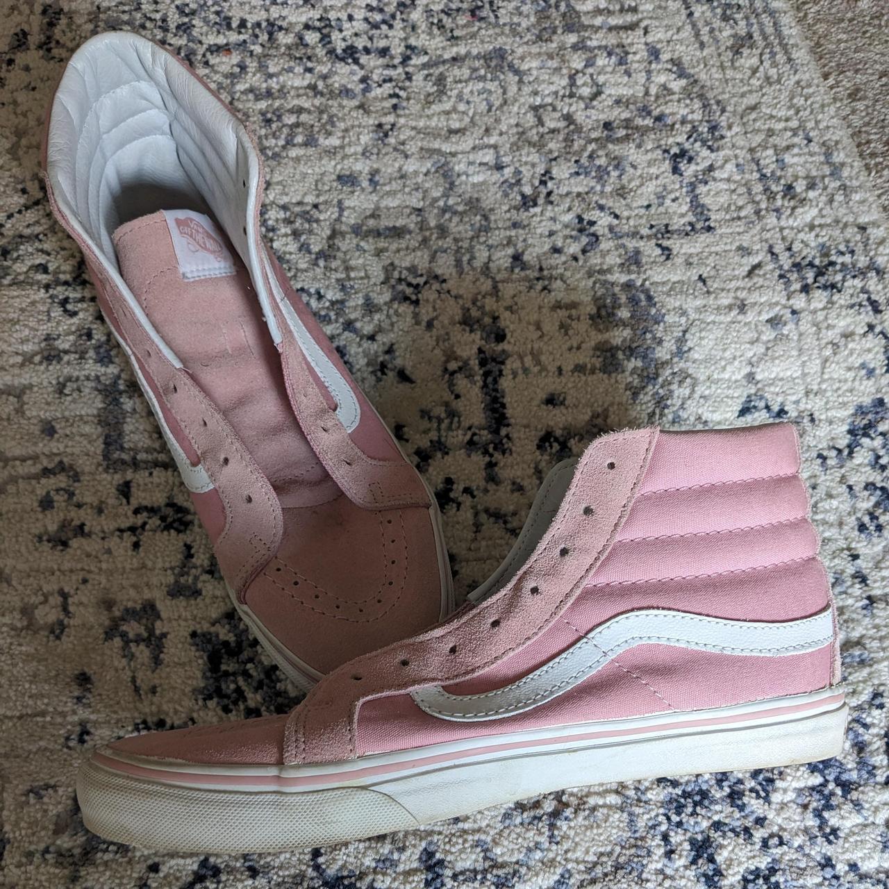 Pink high top vans with suede details. No laces. I