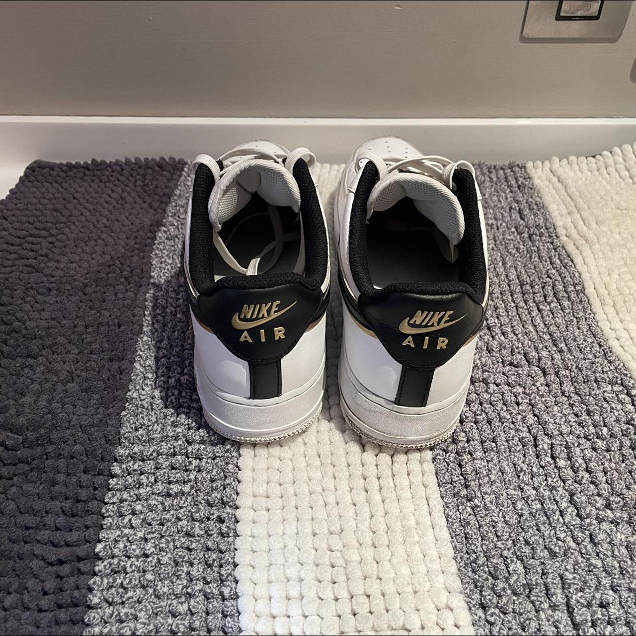 Nike Men's Black and Gold Trainers | Depop