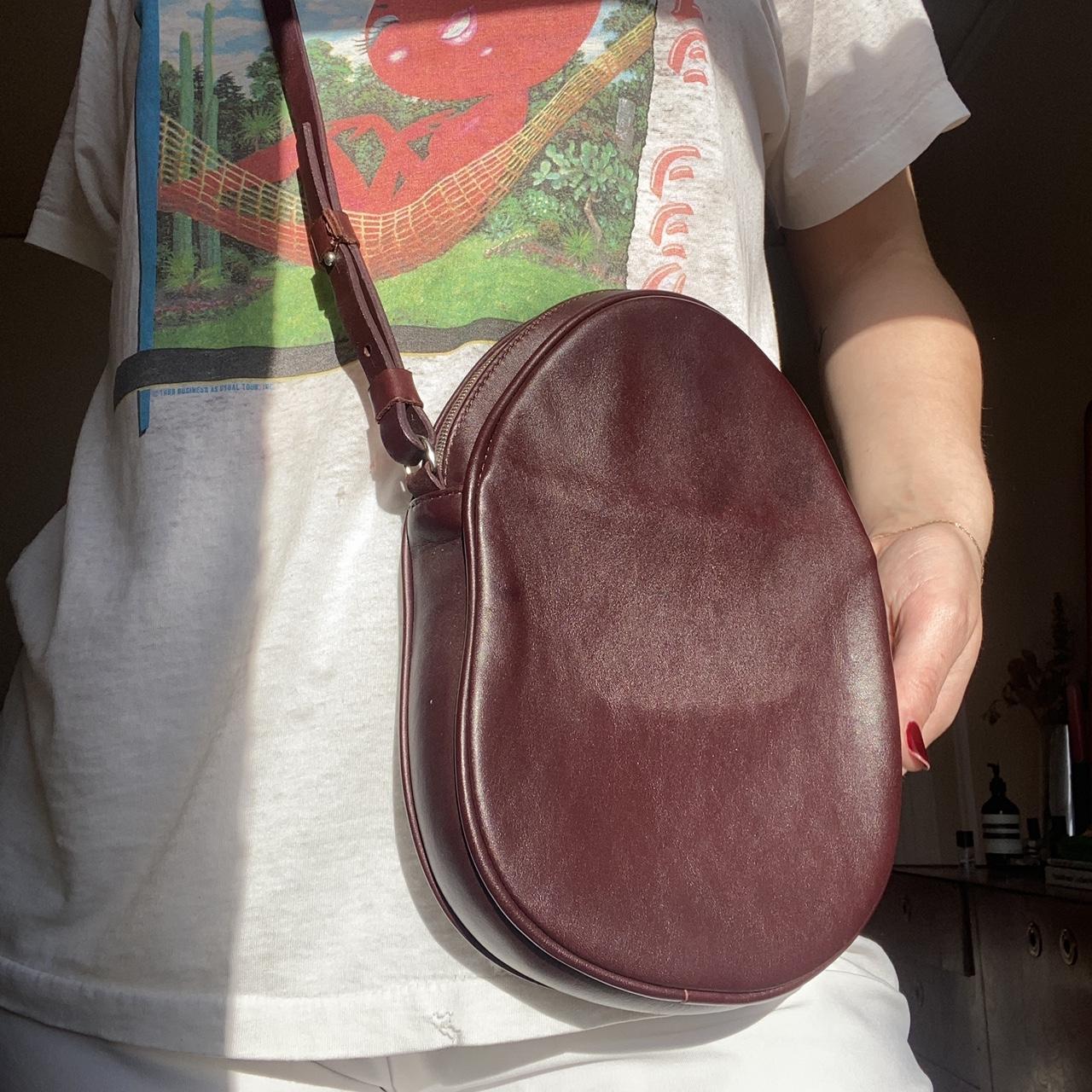 Women's Crossbody bags - Burgundy – Egg shaped plum leather crossbody #therow #baggu …