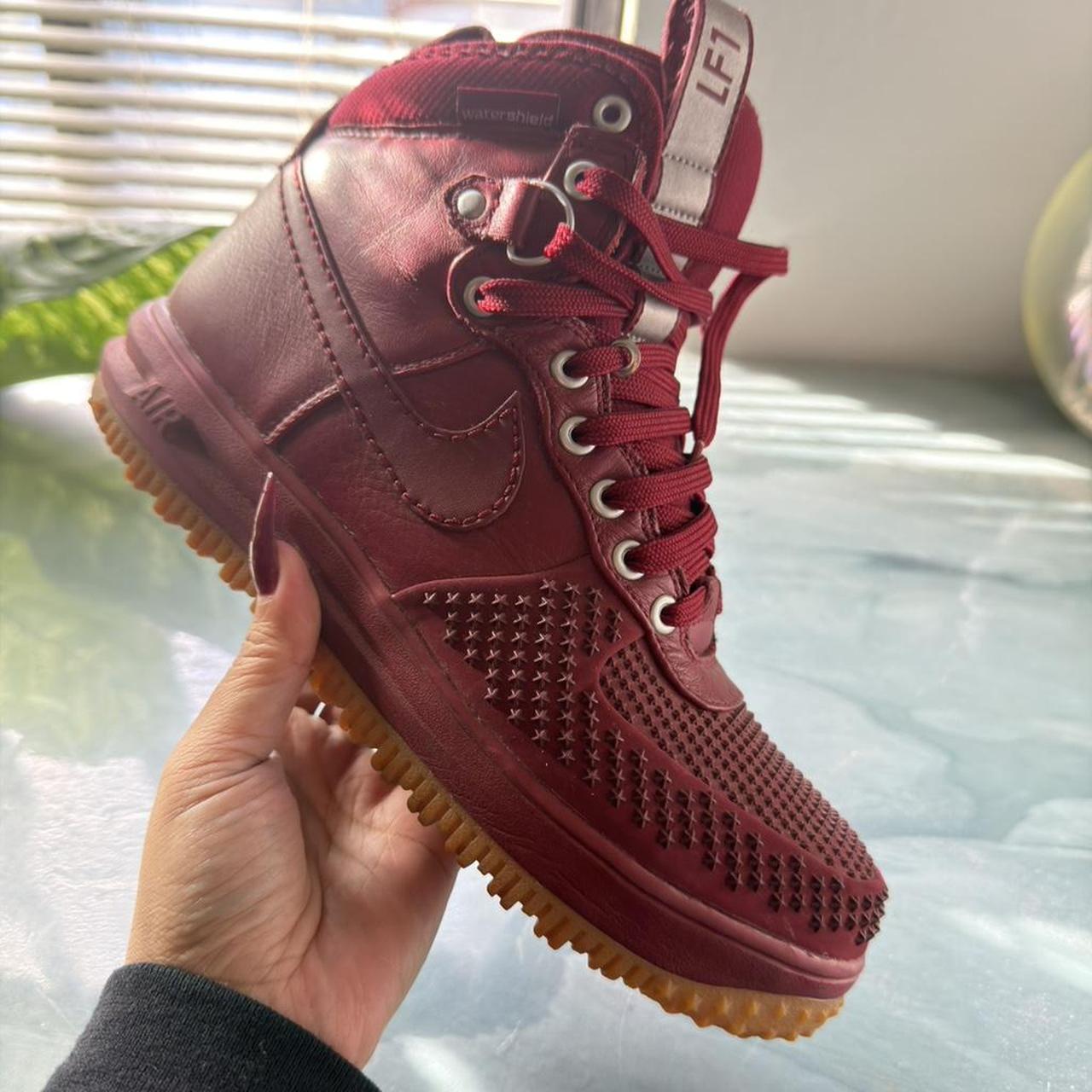 burgundy nike boots for men