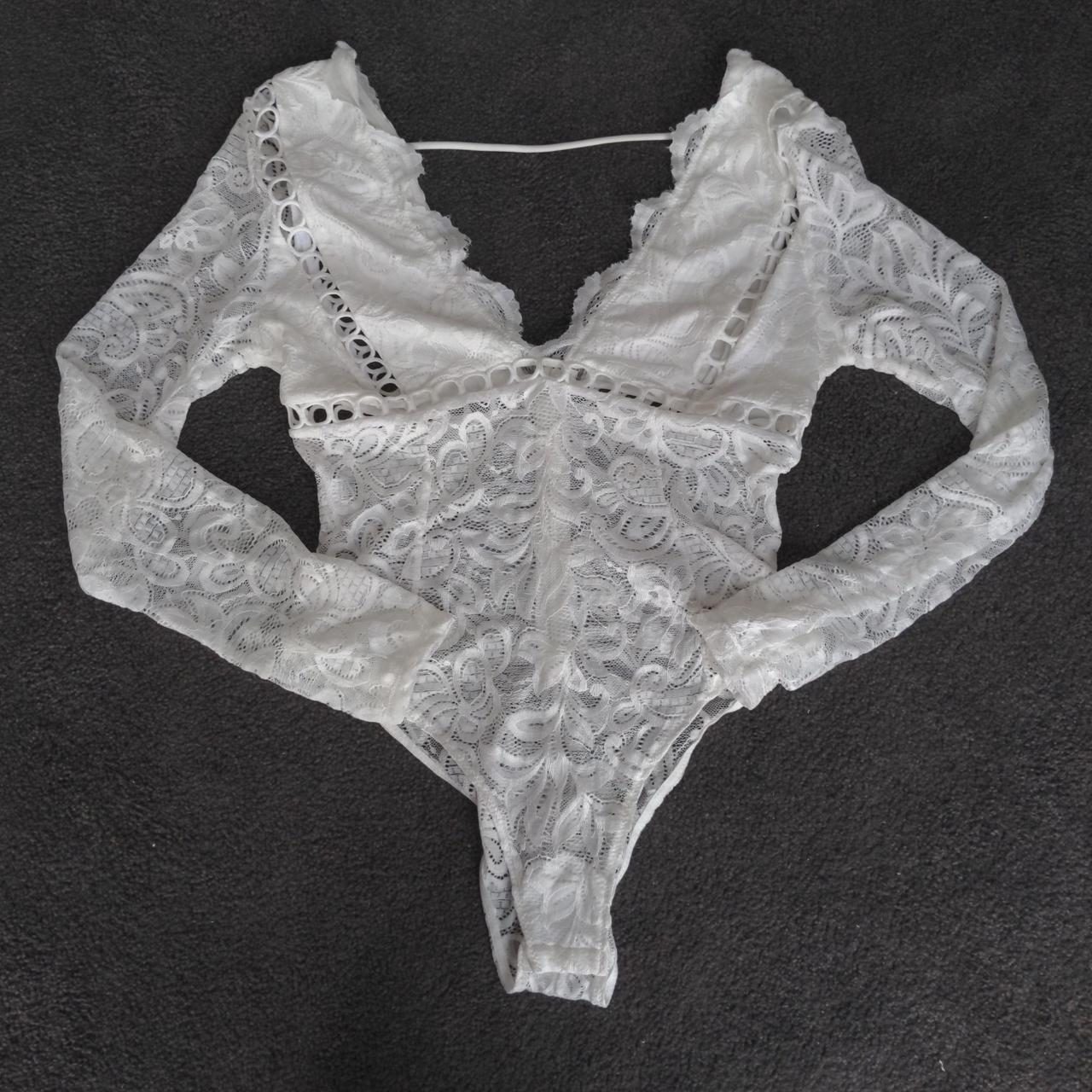 Lace body suit. Clasp bottom with invisible zip at... - Depop