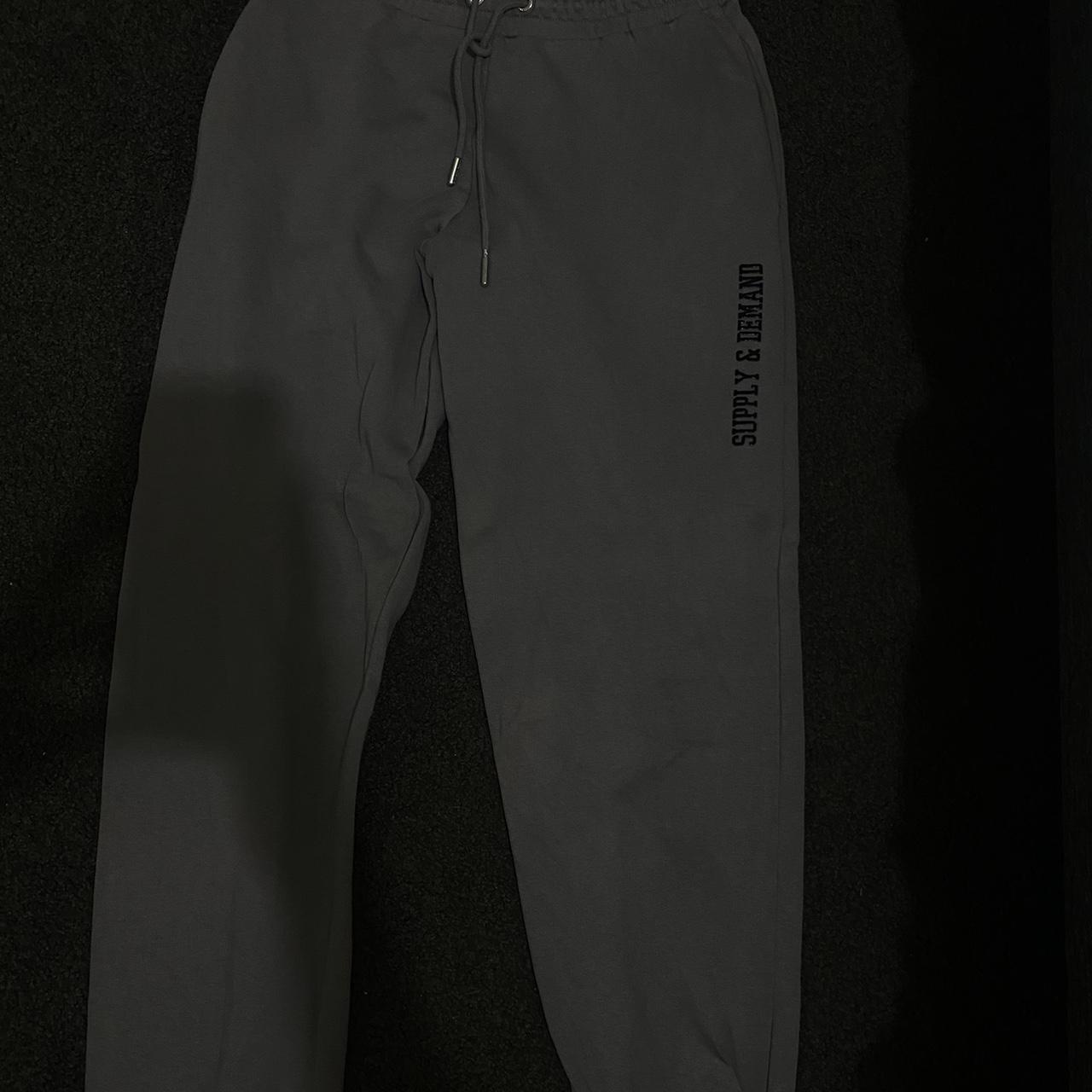Grey supply and demand tracksuit pants Depop