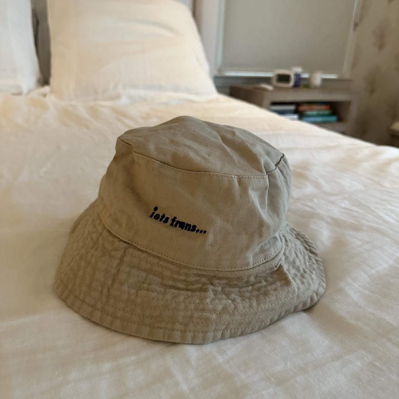Iets frans bucket hat. Cream with black writing.... - Depop