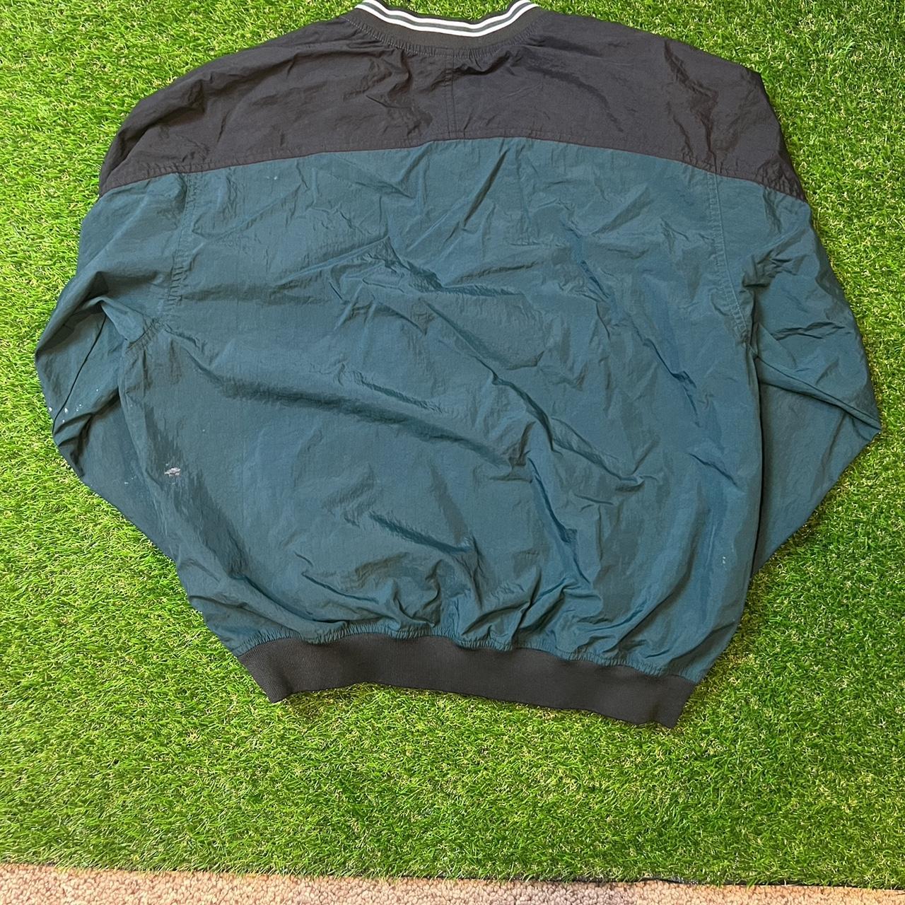 dark green nike windbreaker