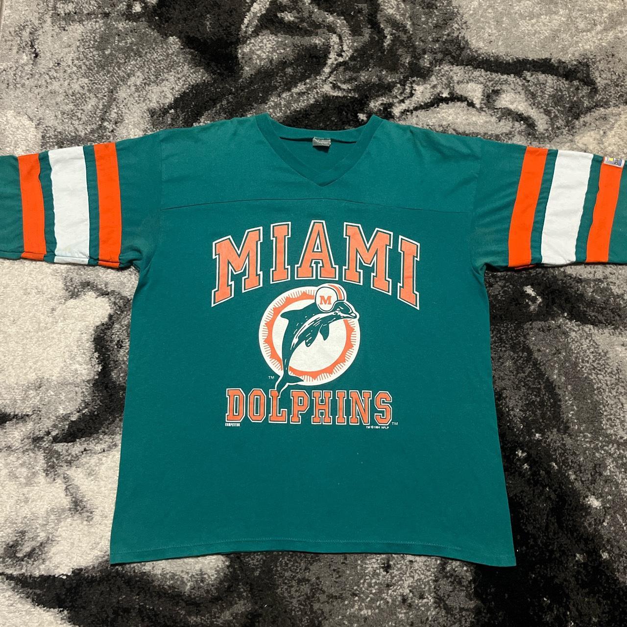 Vintage Logo 7 Miami Dolphins sweatshirt in white. - Depop